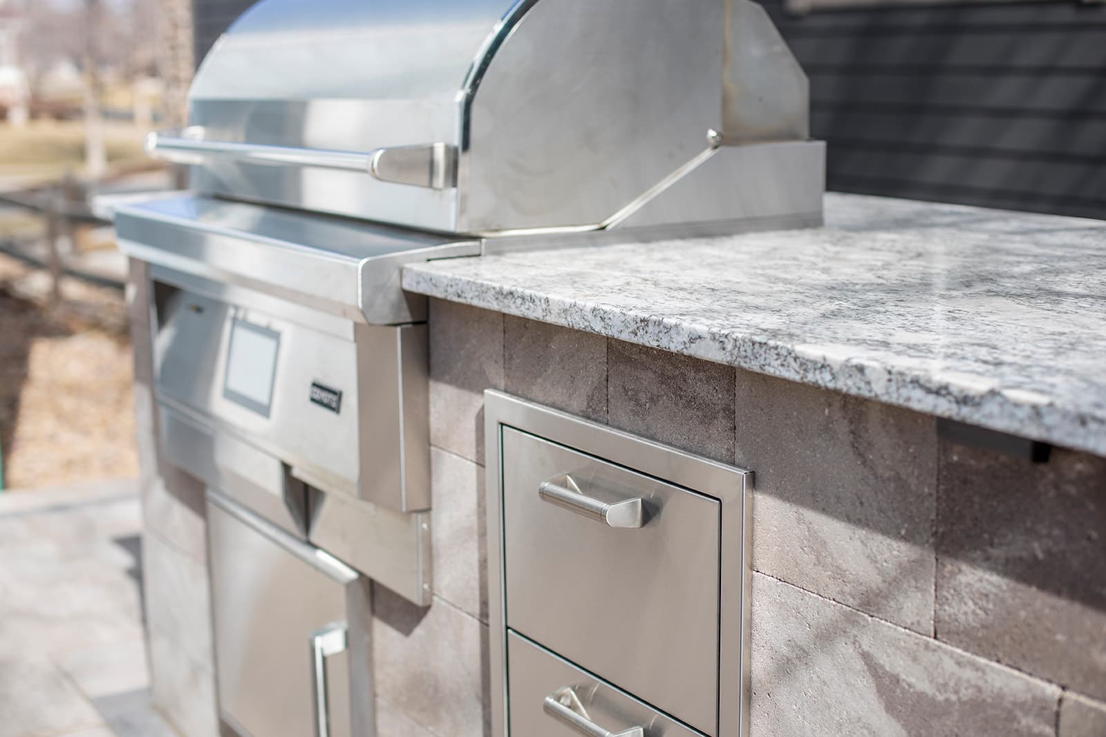 Custom paver patio with natural gas fire pit in Erie, Colorado